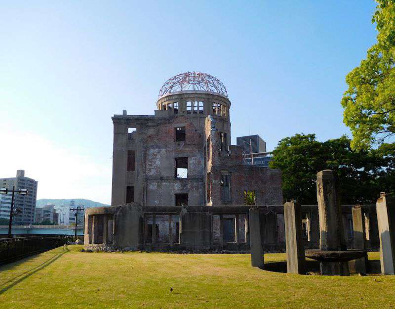 Photograph of The Hiroshima Peace Memorial or Atomic Bomb Dome in the evening sunshine. A sombre reminder of the horrors of nuclear war.